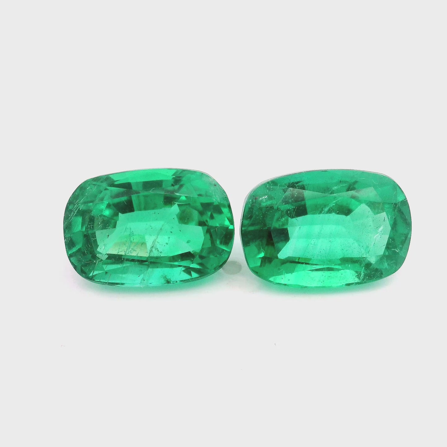 12.80x8.86x7.13mm Cushion Emerald (2 pc 11.28 ct)
