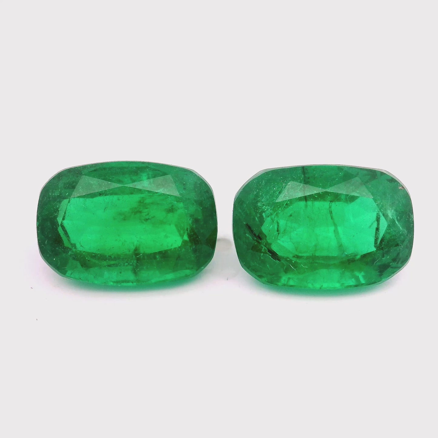 12.84x8.88x6.27mm Cushion Emerald Pair (2 pc 10.61 ct)
