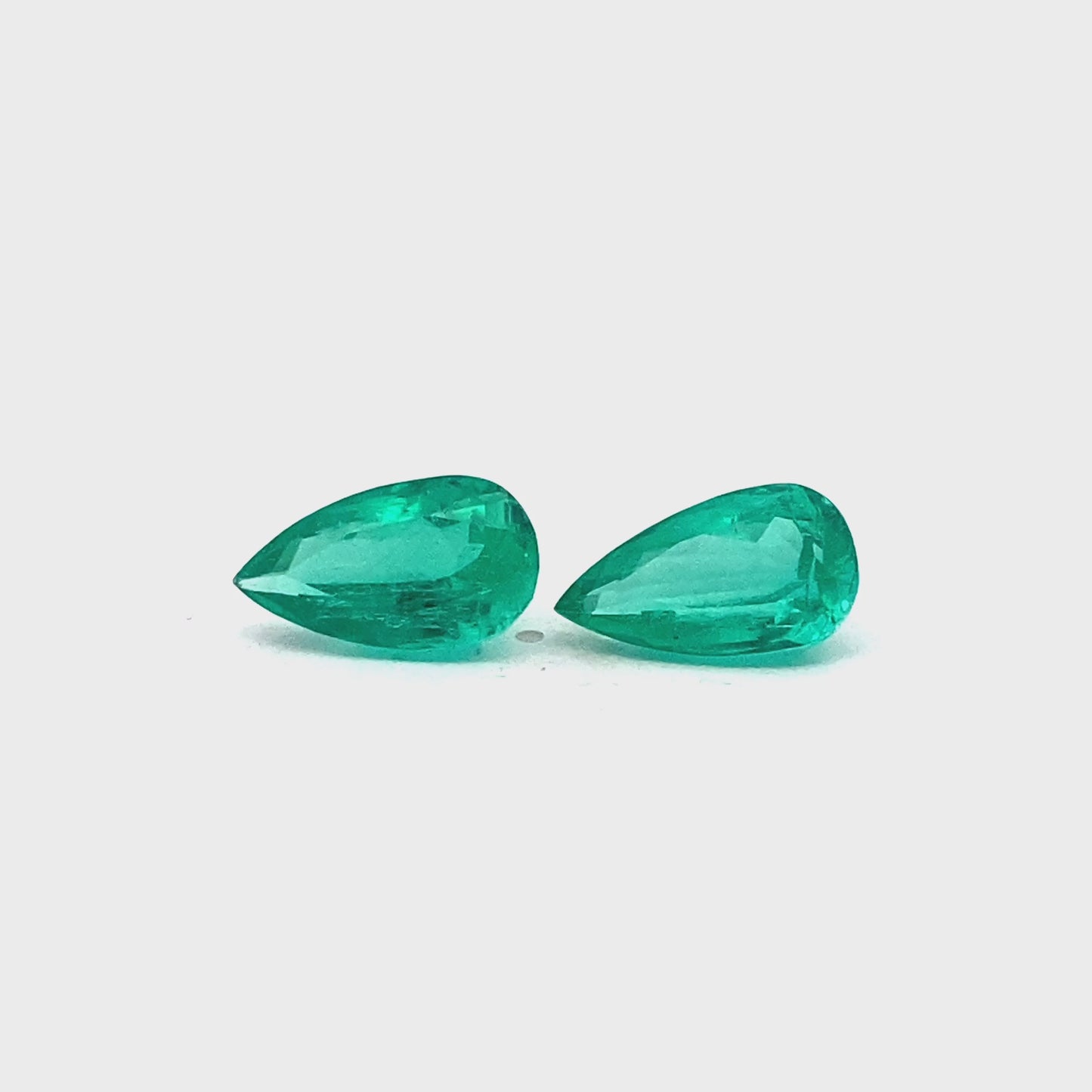 16.79x9.52x7.71mm Pear-shaped Emerald (2 pc 13.87 ct)